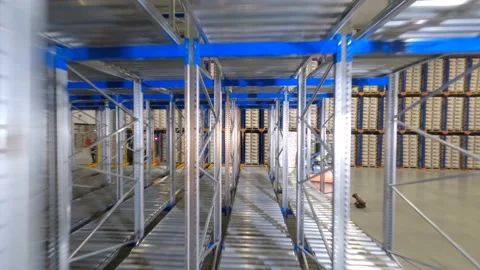 FPV Drone Flyes Through The Warehouse Shalves Video stock 162245768