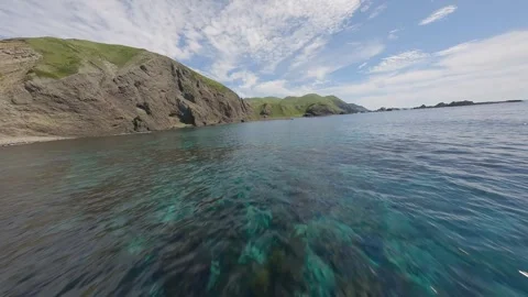 FPV Drone Flying Above the Sky-Blue Sea in Rebun Island, Hokkaido, Japan Video stock 332301548