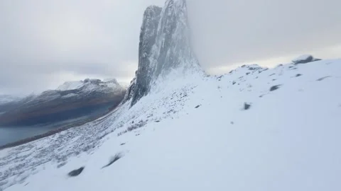 FPV Drone Flying Along Steep Cliff Towards Segla in Senja, Norway 스톡 동영상 308729390