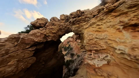 Fpv drone flying around Time and Space spot, in Cala Llentia, Ibiza. July 2022 Stock-Footage 203980625