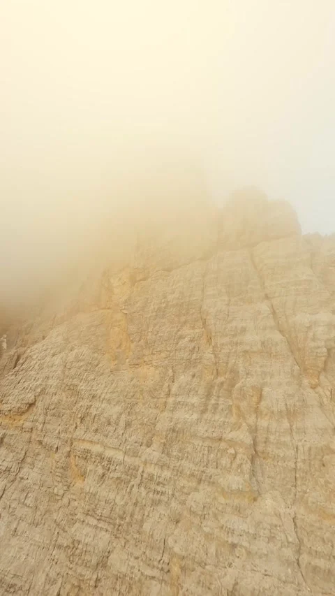FPV drone flying close to the sharp mountain cliffs. Italy, Dolomites Stock Footage 293636086
