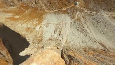 FPV drone flying close to the sharp mountain cliffs. Italy, Dolomites Stock Footage 323226534