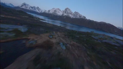 FPV Drone Flying Down Snowy Norway Mountains 스톡 동영상 308729160