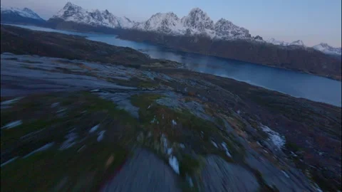 FPV Drone Flying Down Snowy Norway Mountains 스톡 동영상 308729194