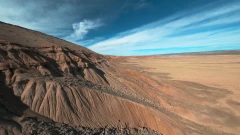 FPV Drone flying fast and close over desert cliffs -- like Mars Stock Footage 165028995