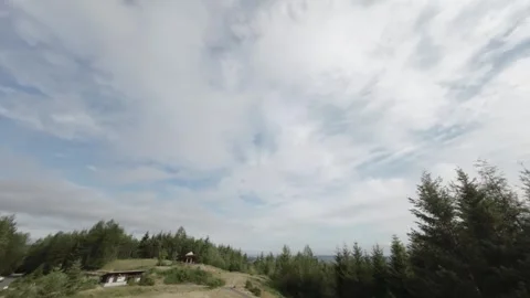 FPV Drone Flying Low Over Field Before Pulling Up (Desaturated) Stock Footage 246348754