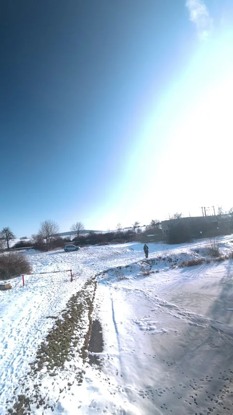 FPV Drone Flying Low Through Snowy Trees Stock Footage 327267989