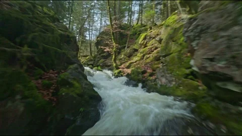 Fpv drone flying over and close to petite cascade du tendon waterfall in Vosges Stock Footage 271677229