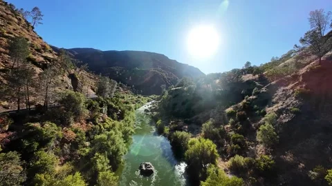 FPV drone flying over Cache Creek river in California canyon Stock Footage 348103507