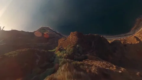 Fpv drone flying over a mountain range near the sea Stock Footage 168617516