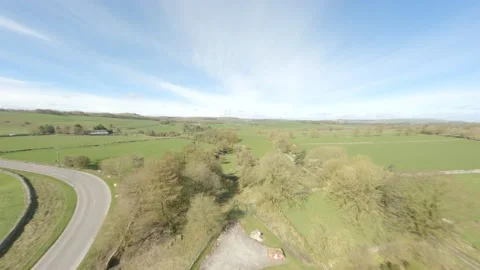 FPV drone flying over road into Horseshoe Pass Stock Footage 238685655