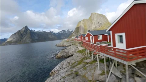 FPV Drone Flying Past Red Rorbu in Lofoten 스톡 동영상 308729208