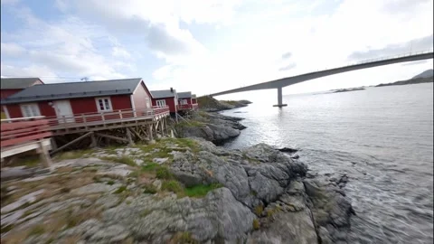 FPV Drone Flying Past Red Rorbu in Lofoten 스톡 동영상 308729211