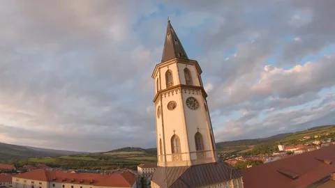 FPV drone flying really close to a church and then diving down Stock Footage 169280503