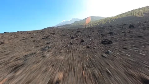 FPV drone flying through a volcanic rocky landscape national park. Rough stone Stock Footage 170848999