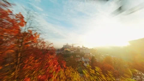 FPV Drone Flyover of Loket’s Medieval Streets and Surrounding Forest Stock Footage 305800678