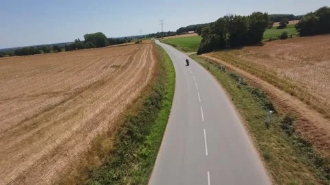 FPV DRONE FOLOWING MOTORCYCLE Stock Footage 314055048