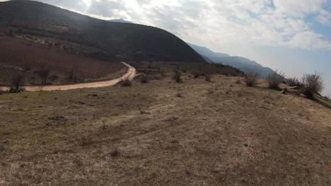 FPV Drone Hovering Rotation over Resava Village Landscape – 17 Seconds Video stock 327345786