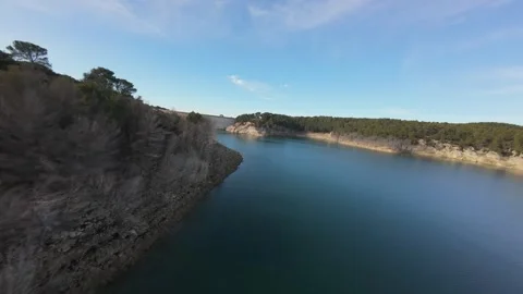FPV drone long shot over Bimont lake and concrete arch dam Stock Footage 335371408