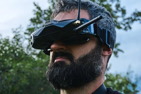 FPV drone man pilot close up portrait outdoor on flight training ground Stock Photos