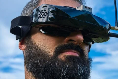 FPV drone man pilot close up face portrait outdoor blue sky Stock Photos