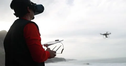 Fpv drone pilot flying with quadcopter outdoor Stock Footage 145430825