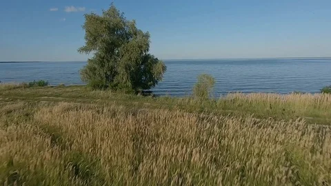 FPV Drone racing view. Dynamic flight over sea and coastline Stockbeeldmateriaal 116961625