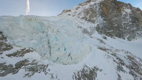 FPV drone reaches a glacier at the summit of a French mountain Stock Footage 253555136