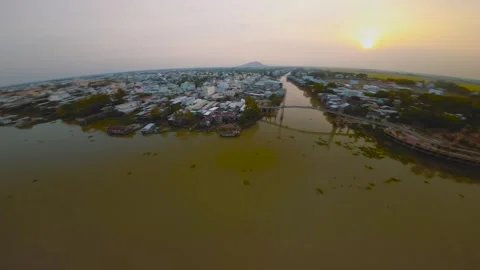 FPV drone reverse shot of Chau Doc floating village in Asia, Vietnam Mekong Stock Footage 242914427