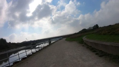 FPV drone riverside pathway Stock Footage 169108634