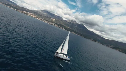 FPV drone shot over white sailboat. Stock Footage 154140135