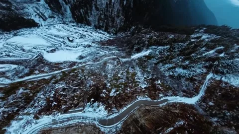 FPV Drone shot of  snow storm in the forest road at daytime (Aerial View). Stock-Footage 259390158