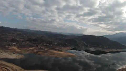 FPV Drone Straight Flight over Tikvesh Lake – Cloudy Weather Aerial Video stock 327345693