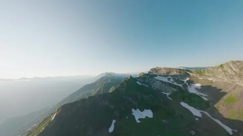 Fpv drone sunrise flight over alpine ridge and peaks Stock Footage 336626073