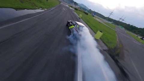 FPV Drone Transition Tracking Damp Track Tandem Drift with Tire Close-up 库存影片 336102724