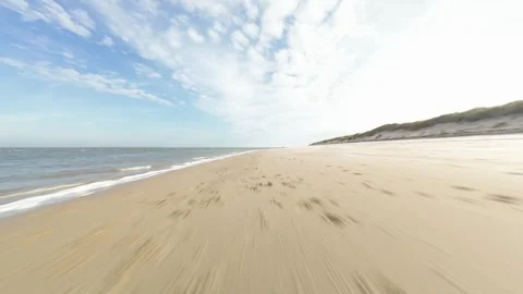 FPV drone video of the beach at Texel, The Netherlands. Sea, sand, dynamic Stock Footage 308413095