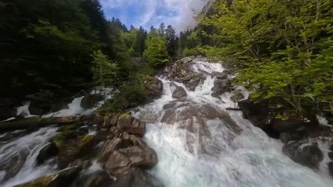FPV drone video of flying over the Gave du Marcadau waterfall river. Stock Footage 244045846