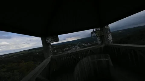 FPV drone video of flying through a panoramic watch tower reavealing the city Stock Footage 285772849