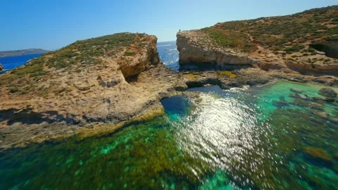 FPV drone view of Comino island, Blue lagoon, Malta island Stock Footage 314669351
