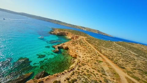 FPV drone view of Comino island, Blue lagoon. Malta island Stock Footage 314669367