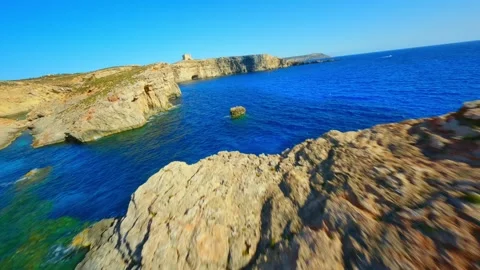 FPV drone view of Comino island, Blue lagoon. Malta island Stock Footage 314669391