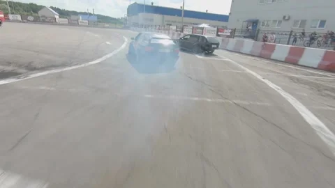 FPV drone view. Drift competitions. Pursuit of drift cars. Ukraine, Kyiv - 2 Vídeos de archivo 144610304