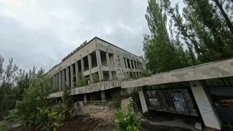 FPV drone view. Flight over central square and inside building of abandoned Stock Footage 155378058