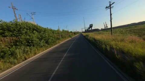 FPV drone view flight over coal delivery terminal with port cranes for thermal Vídeos de archivo 169505479