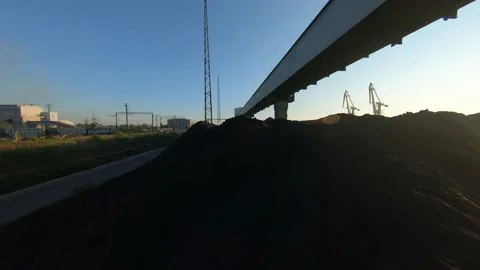 FPV drone view flight over coal delivery terminal with port cranes for thermal 스톡 동영상 169505857