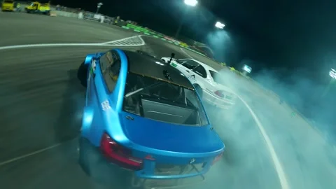 FPV Drone view. Night Steam Drift. BMW M2 Drifting with an Rival. Video stock 243801198