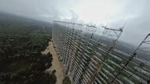 FPV drone view of over horizon duga radar system in the rain. The Chernobyl Vídeos de archivo 155377780