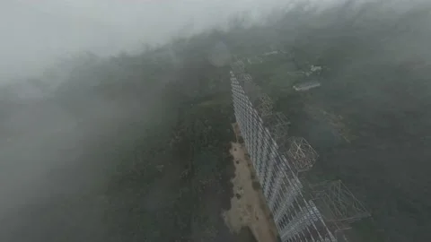 FPV drone view of over horizon duga radar system in the rain. The Chernobyl Vídeos de archivo 155377881