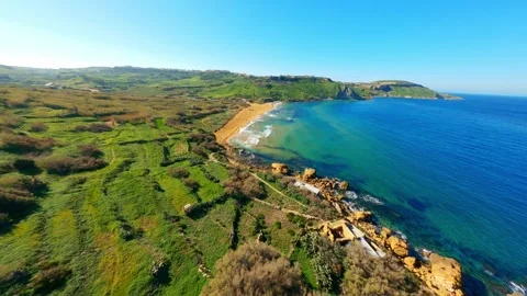 FPV drone view of Ramla bay on Gozo island, Malta Stock Footage 314669242