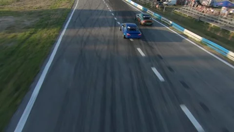 FPV drone view. Ukrainian drift championship. Close pursuit of drift cars Vídeos de archivo 144610616